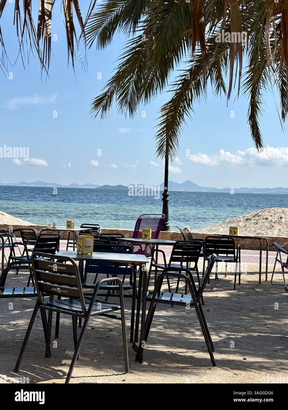 Restaurant view of the Mar Menor coastal salt water lagoon located in the Murcia region of South-eastern Spain - Smartphone Captured Stock Image