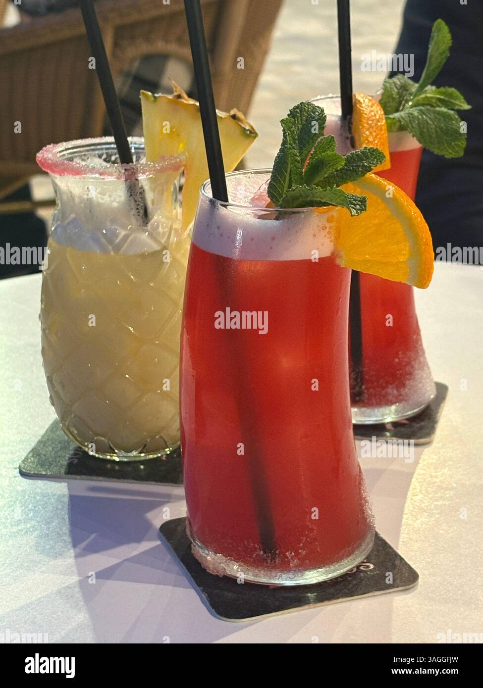 Refreshing Cocktail beverages garnished with fruits and herbs to be enjoyed social gatherings or celebrations. - Smartphone Captured Stock Image