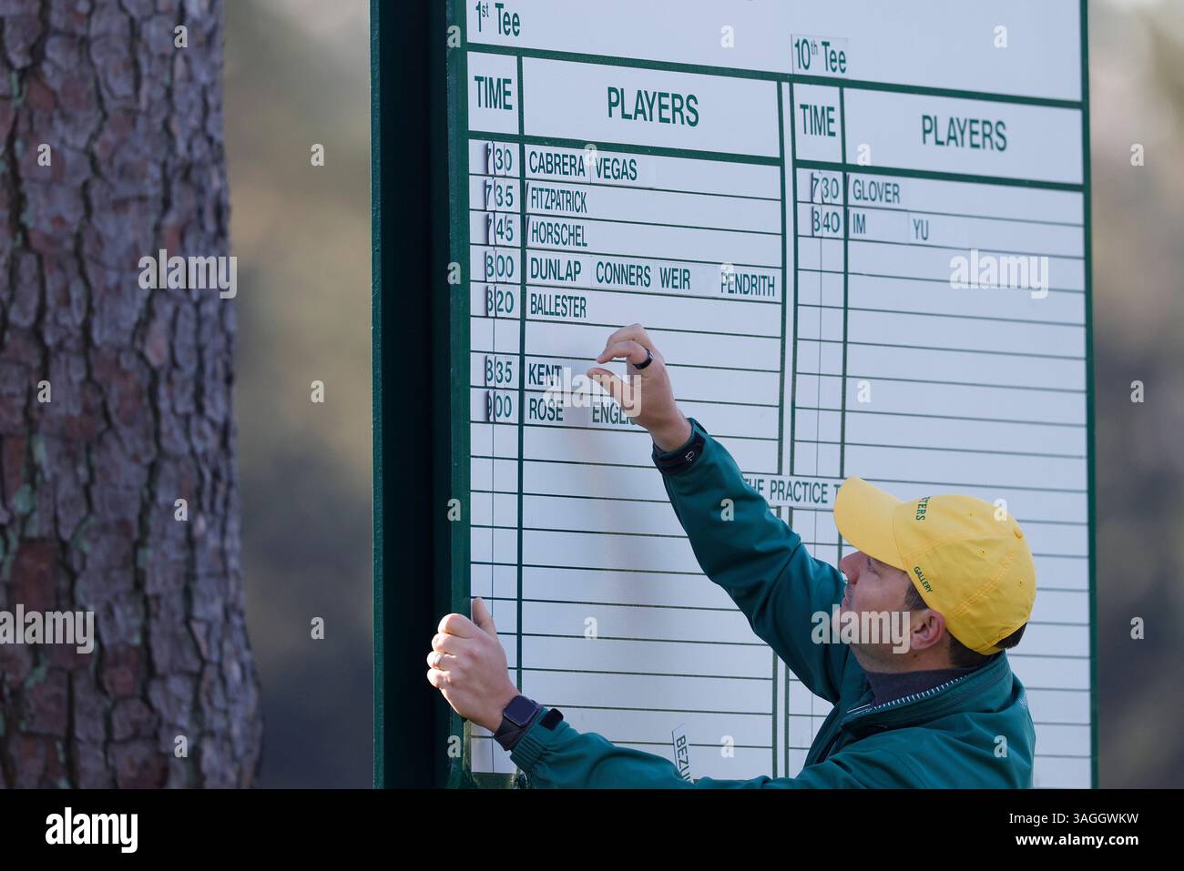 Augusta, United States. 08th Apr, 2025. A worker adds names to a players board during a practice round leading up the Masters Tournament at Augusta National Golf Club in Augusta, Georgia on Tuesday, April 8, 2025. Photo by John Angelillo/UPI Credit: UPI/Alamy Live News Stock Photo