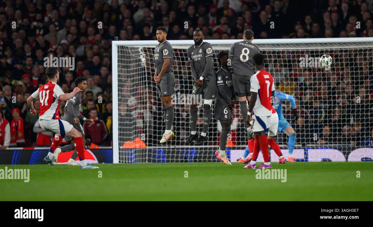 London, UK. 08th Apr, 2025. Arsenal v Real Madrid - Champions League Quarter Final - Emirates Stadium. Declan Rice scores his first of two amazing 2nd half free kicks for Arsenal.                                             Picture Credit: Mark Pain / Alamy Live News Stock Photo