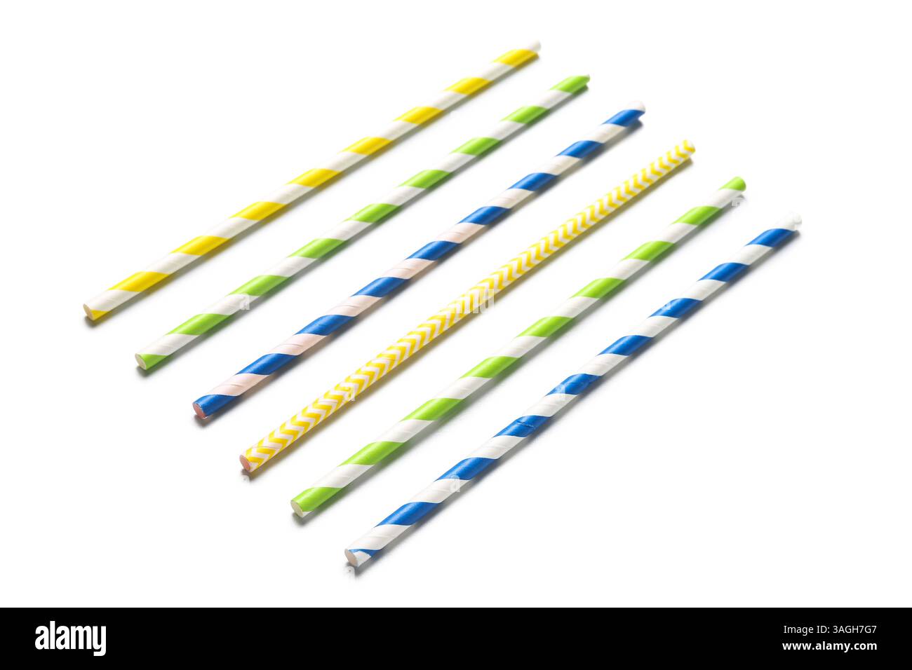 Different paper drinking straws on white background Stock Photo