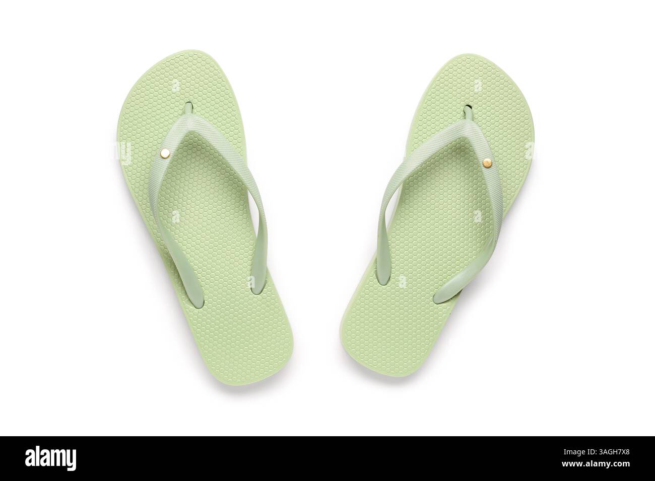 Green female flip flops on white background Stock Photo - Alamy