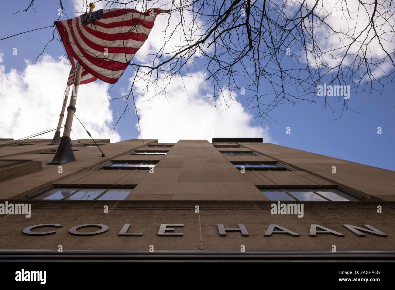 An American flag flies over a Cole Haan store on 5th Avenue, Tuesday ...