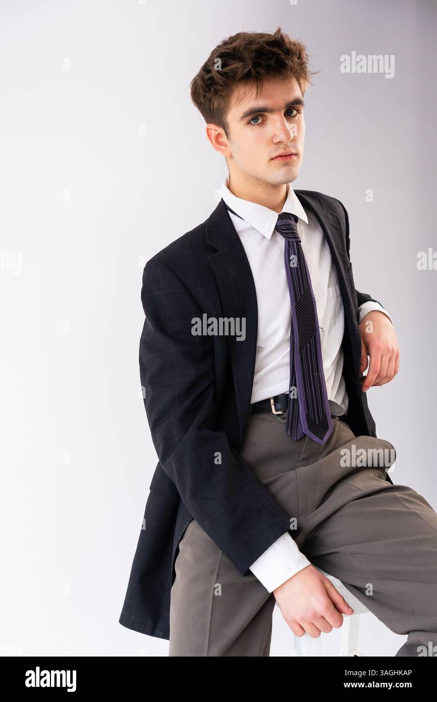 Seated person wearing a dark jacket hi-res stock photography and images ...