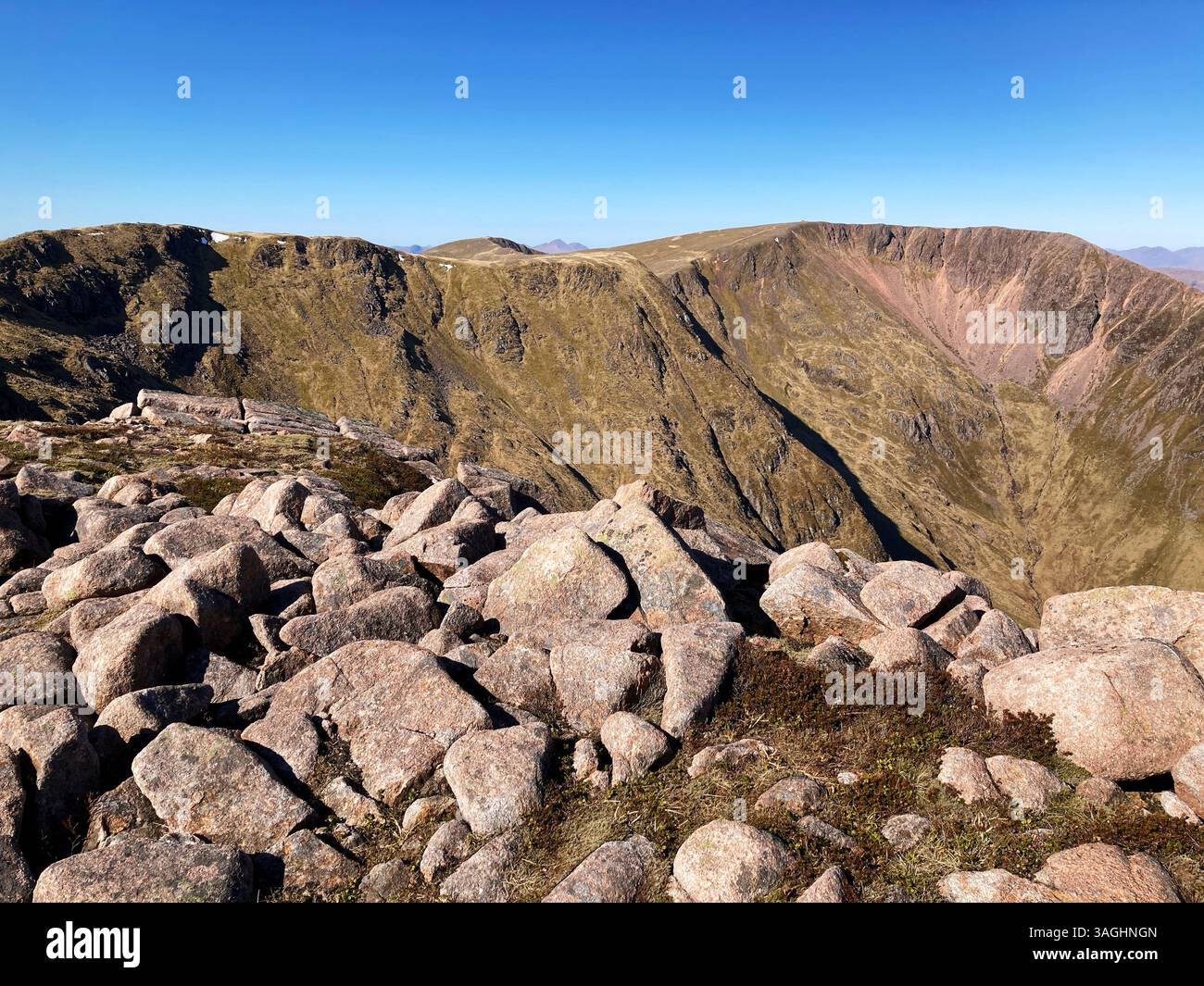 View of the ridge and summit of munro Mullach nan Coirean, The Mamores mountain range, near Fort William, Scotland - Smartphone Captured Stock Image
