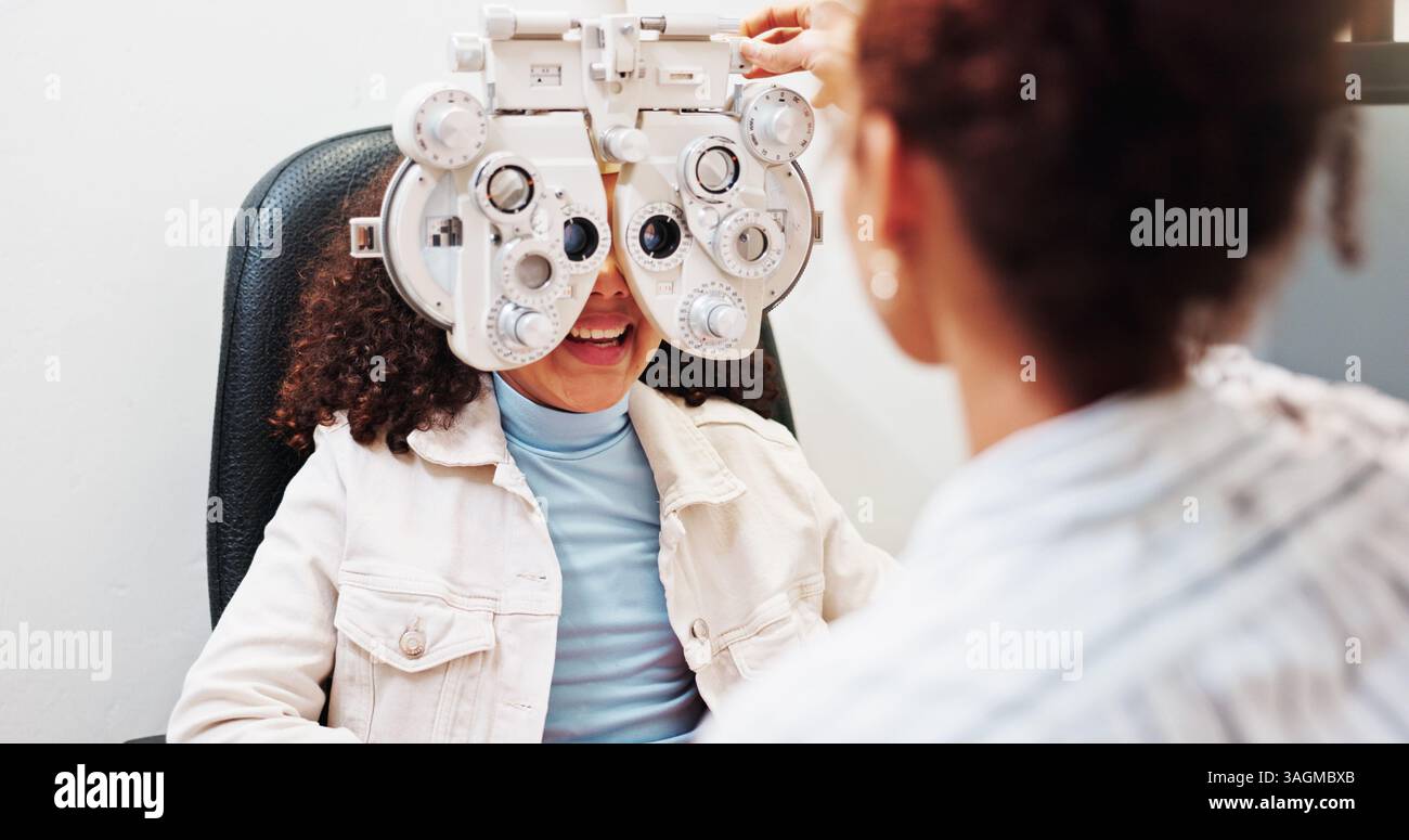 Eye test, ophthalmology and optician with child in clinic with lensometer for prescription lens. Optometry, wellness and optometrist with girl kid for Stock Photo