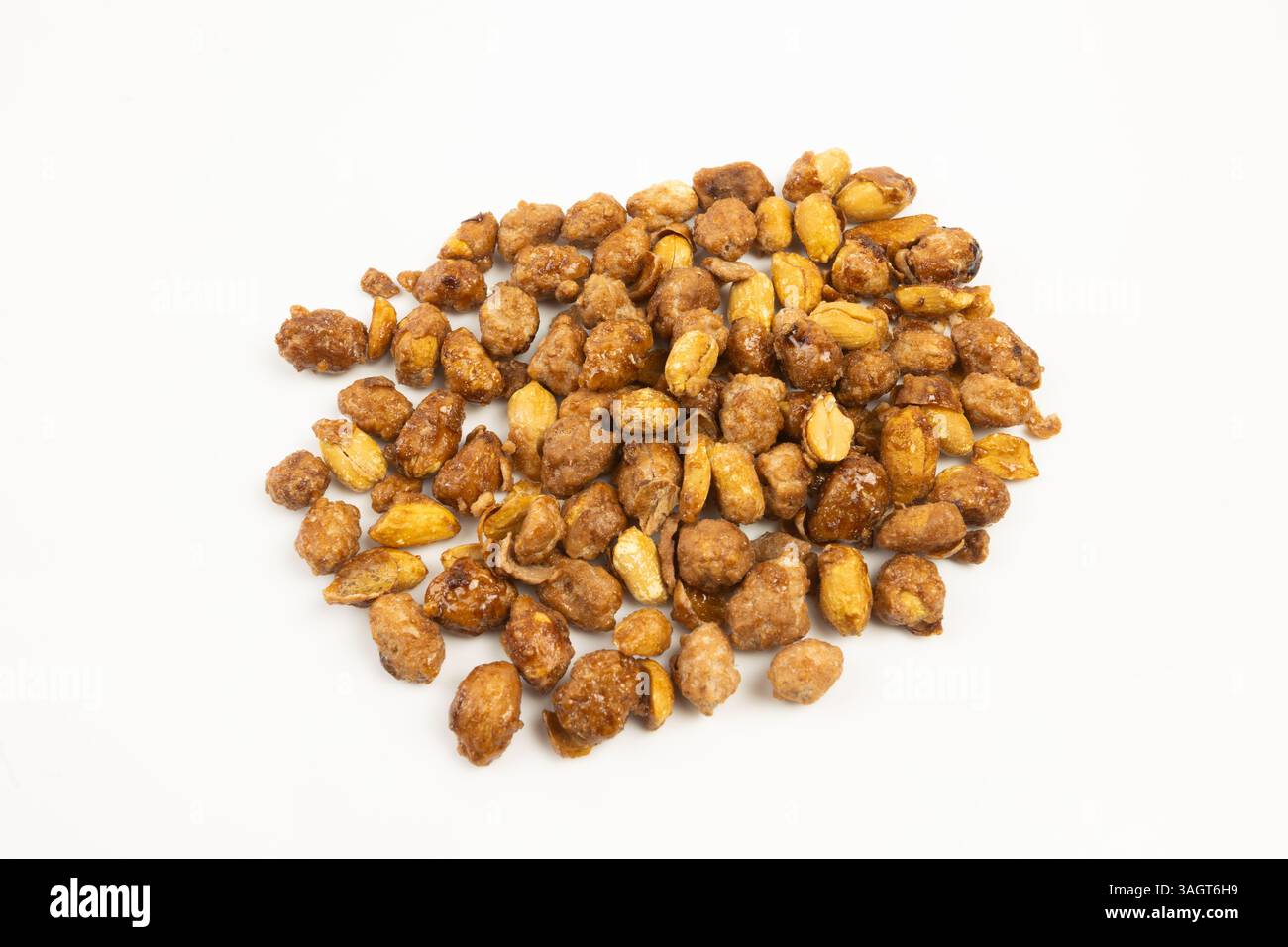 caramelized peanuts on a white background Stock Photo