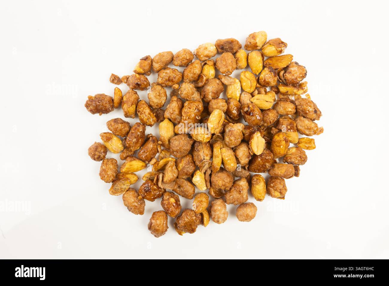 caramelized peanuts on a white background Stock Photo