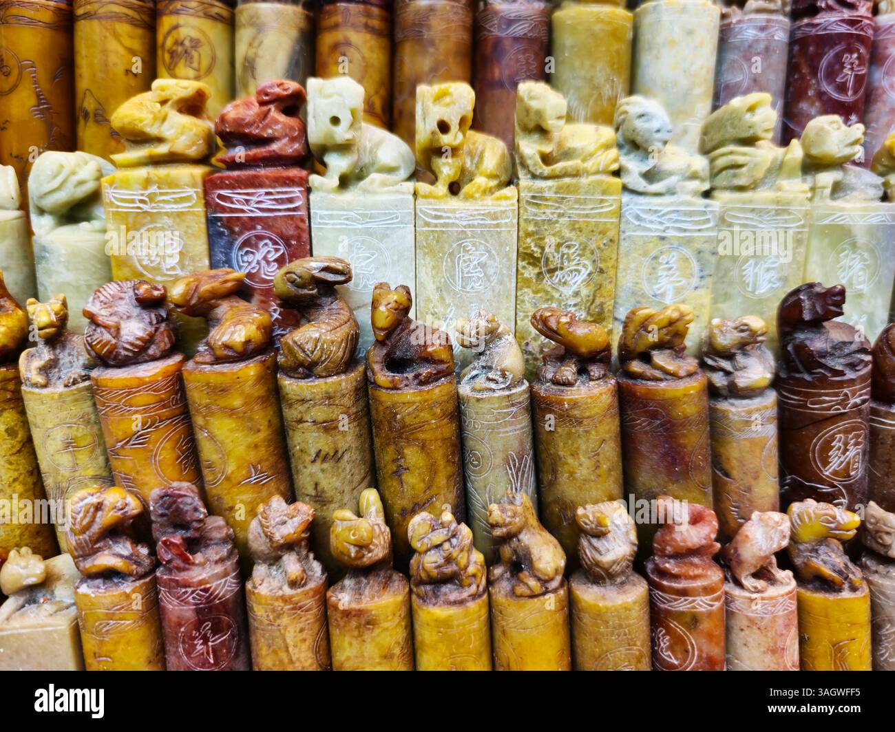 Traditional Chinese stone seals displayed at an artisan shop at Man Wa lane in the Central District in Hong Kong. - Smartphone Captured Stock Image