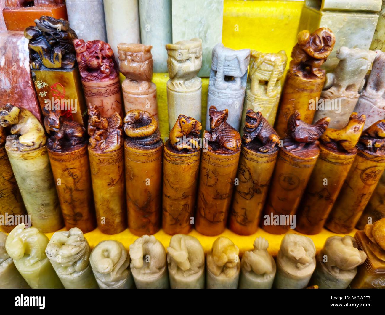 Traditional Chinese stone seals displayed at an artisan shop at Man Wa lane in the Central District in Hong Kong. - Smartphone Captured Stock Image