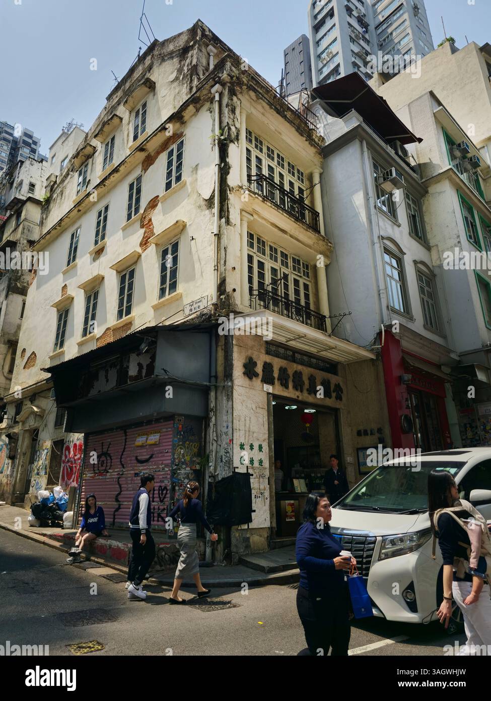 A beautiful old building on the corner of Peel Street and Hollywood Road in Hong Kong. - Smartphone Captured Stock Image