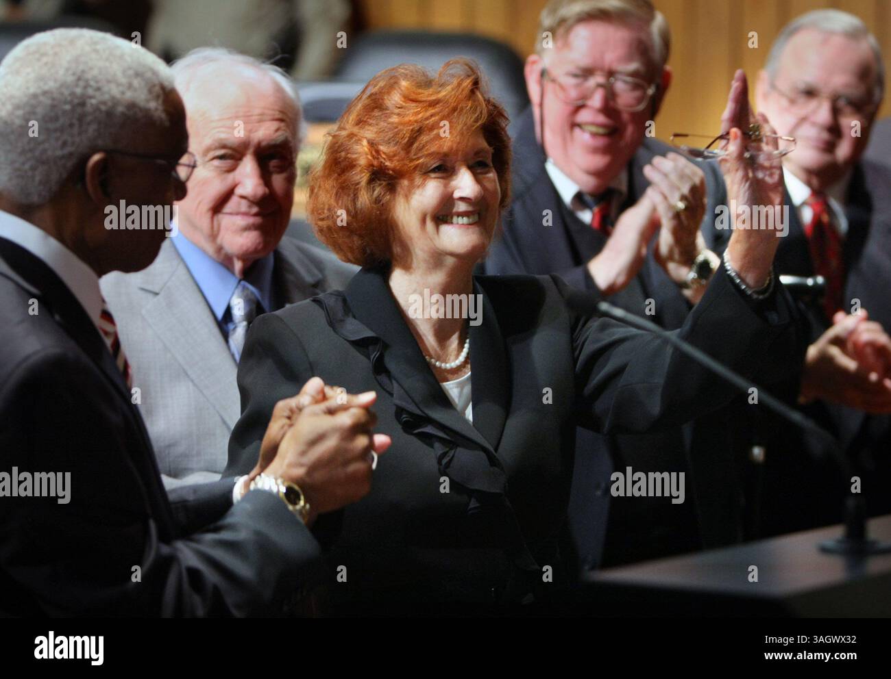 Oct 26, 2009 (jwavery) Photo by Jim Weber: Former Shelby County Mayor AC Wharton, left, joins with Joyce Avery, who was sworn in earlier as Wharton's temporary replacement, as the pair receive an ovation during a ceremony in the Commission Chambers Monday morning. After winning a sound victory in this month's special election to fill Willie Herenton's vacated seat, Memphis' new Mayor AC Wharton was sworn in Monday afternoon in the Hall of Mayors at City Hall. (Credit Image: © The Commercial Appeal/ZUMApress.com) Stock Photo