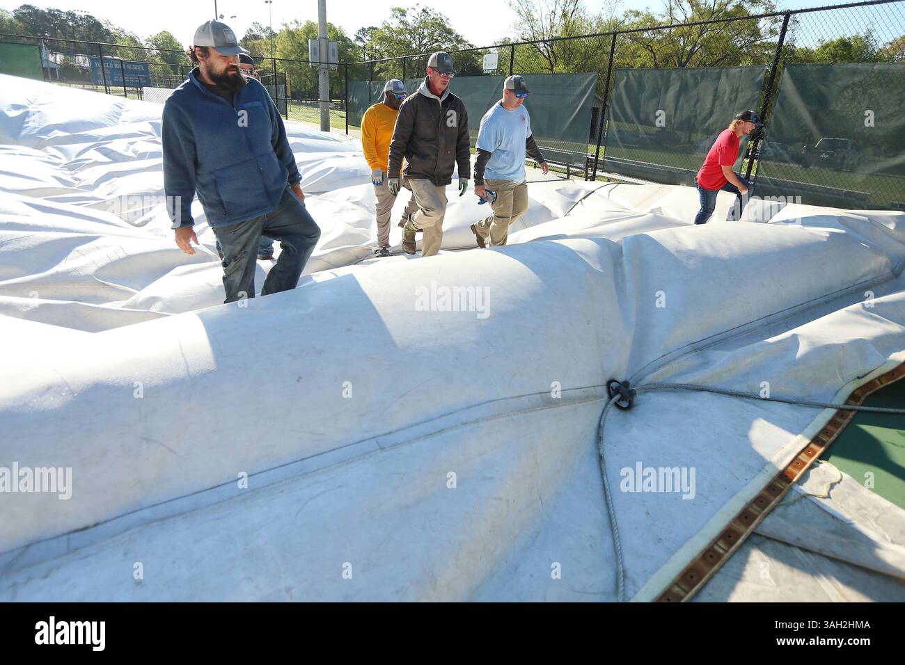 Employees with Tupelo Parks and Rec, along with help from the Tupelo