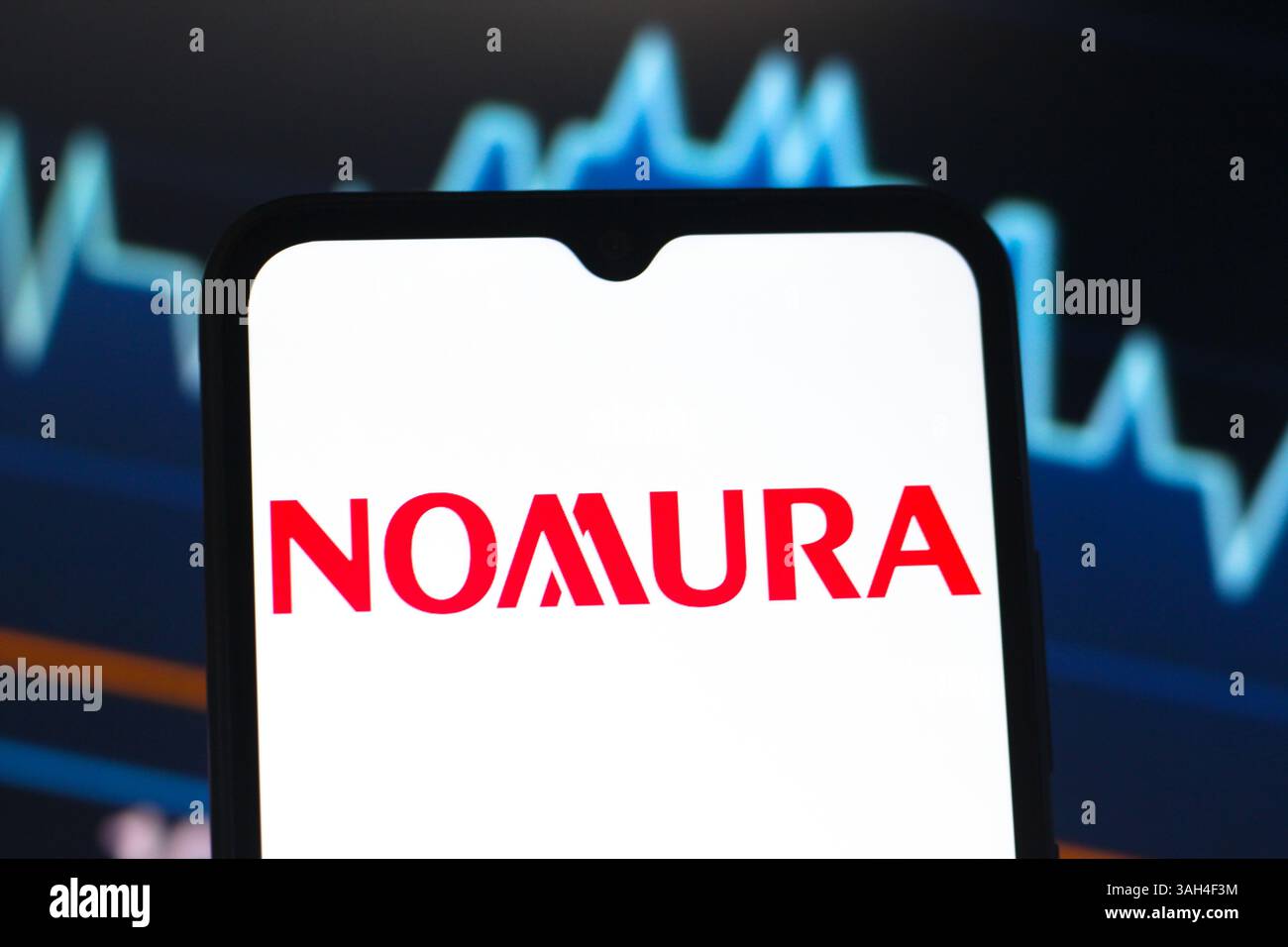 In this photo illustration, the Nomura Holdings logo is seen displayed ...