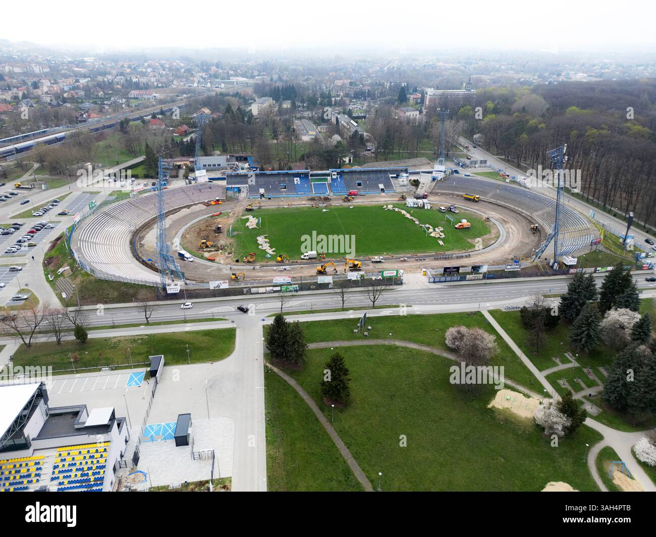 TARNÓW, POLAND – APRIL 2, 2025: Aerial view of the Unia Tarnów Speedway and Football Stadium in Tarnów, currently under renovation. By drone. Stock Photo