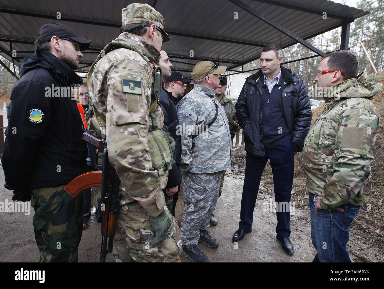 March 31, 2015 - Kiev, Ukraine - Kiev Mayor VITALY KLICHKO (2-R) during practical training in tactical medicine,near Kiev, Ukraine,31 March 2015. For participants simulate real situations and providing emergency medical care and civil defence in emergency situations  (Credit Image: © Serg Glovny/ZUMA Wire/ZUMAPRESS.com) Stock Photo