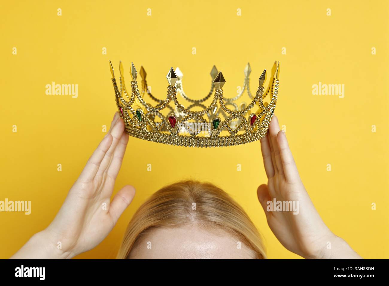 Princess wearing golden crown hi-res stock photography and images - Alamy