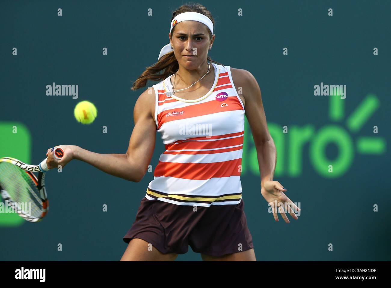 March 25, 2015 - Key Biscayne, Florida, United States - KEY BISCAYNE, FL-MAR 25: Monica Puig of Puerto Rico hits a forehand against Irina Falconi (not pictured) during the first round of women's singles on day three at the Miami Open at Crandon Park Tennis Center. Falconi won 7-6, 7-6. (Credit Image: © Debby Wong/ZUMA Wire) Stock Photo