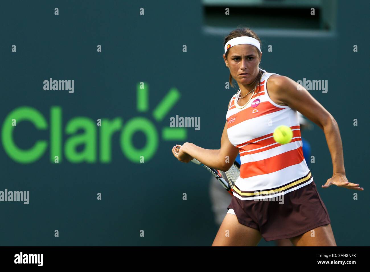 March 25, 2015 - Key Biscayne, Florida, United States - KEY BISCAYNE, FL-MAR 25: Monica Puig of Puerto Rico hits a forehand against Irina Falconi (not pictured) during the first round of women's singles on day three at the Miami Open at Crandon Park Tennis Center. Falconi won 7-6, 7-6. (Credit Image: © Debby Wong/ZUMA Wire) Stock Photo