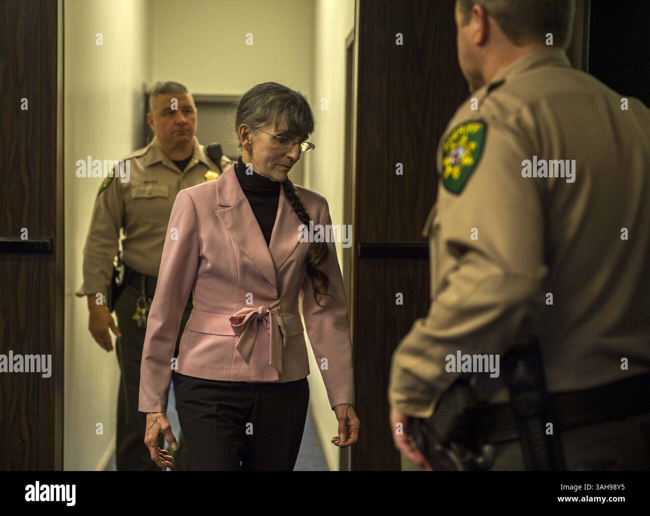 April 8, 2015 - Placerville, Calif, USA - Flanked by court security ...