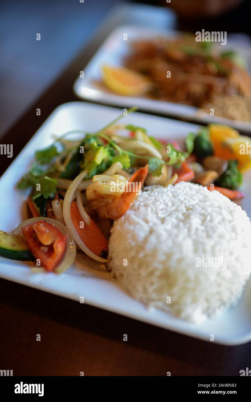 White Rice And Tea Dinner Dish with white rice and vegetables in restaurant Stock Photo - Alamy