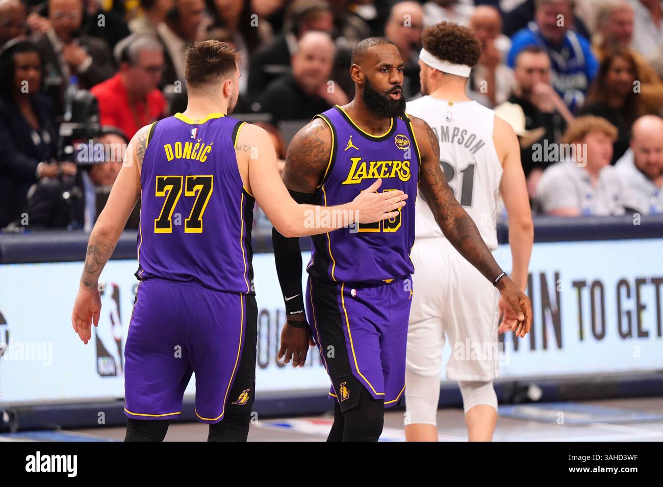 Los Angeles Lakers' Luka Doncic (77) and LeBron James (23) celebrate in ...