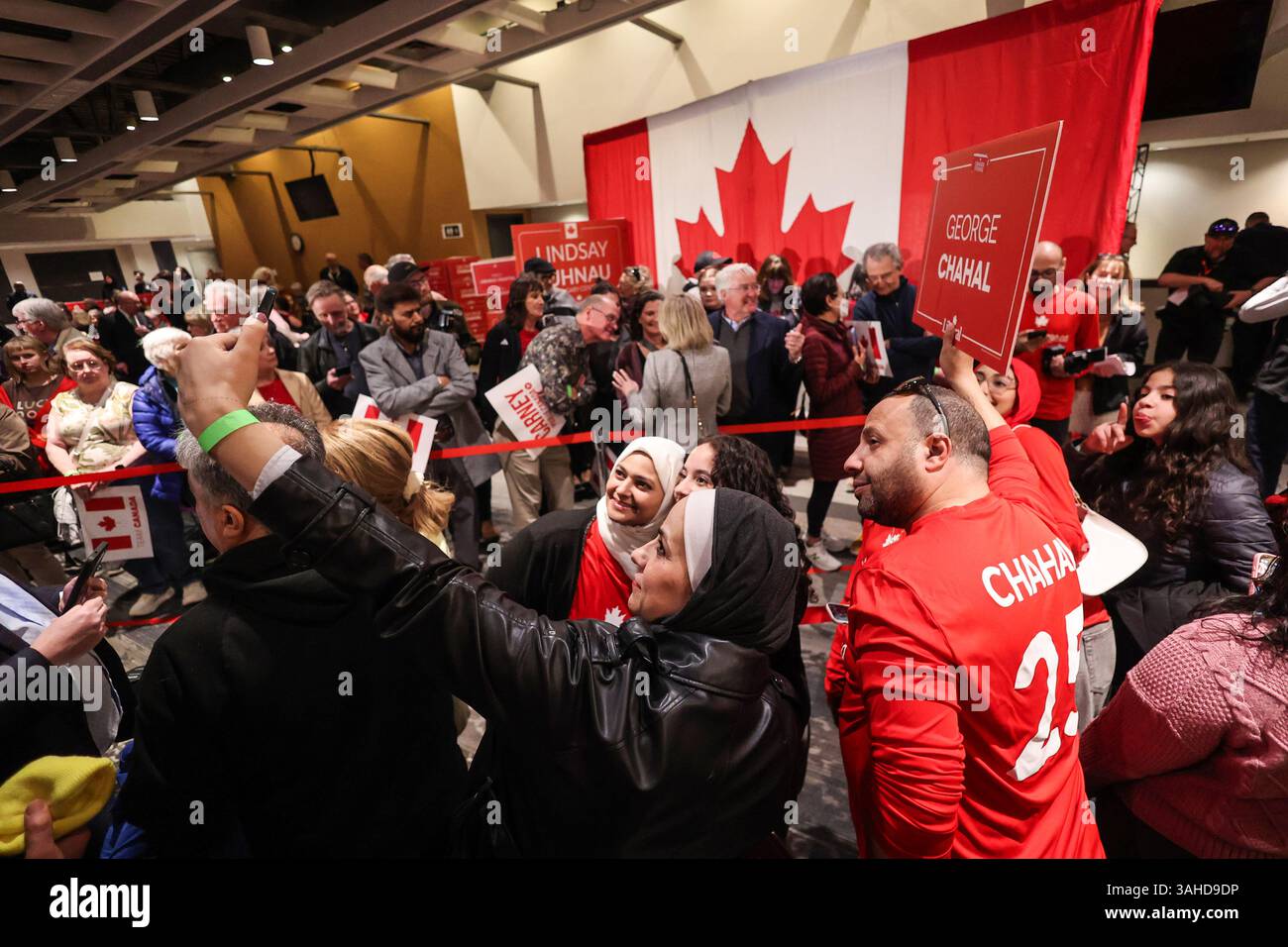 Liberal Rally Calgary, Canada. 08th Apr, 2025. Supporters of the Liberal Party take ...