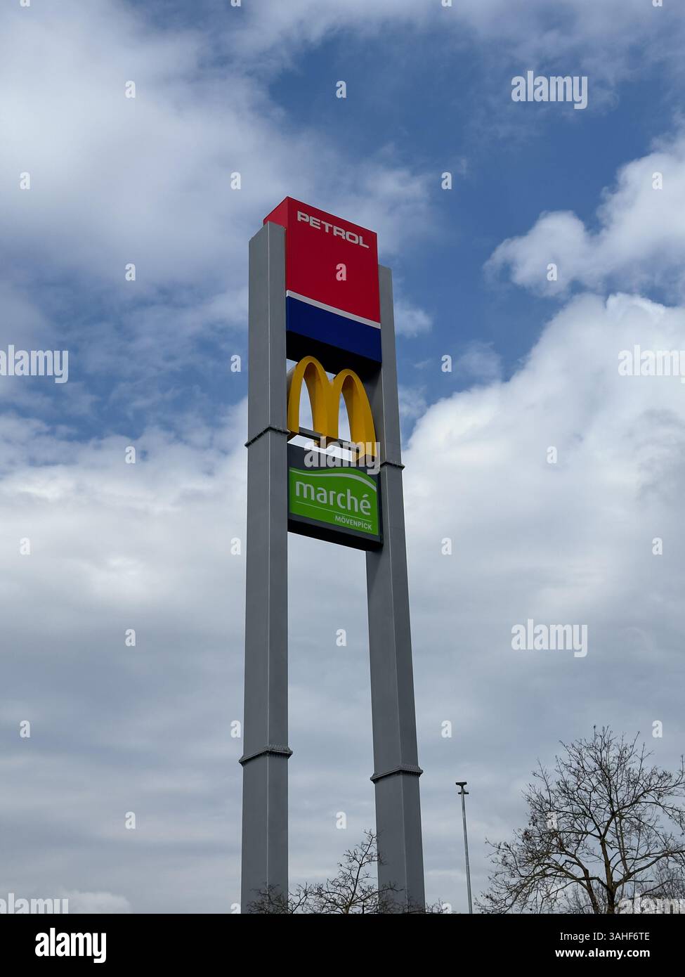 LJUBLJANA, SLOVENIA – march 26, 2025: A tall sign displays the logos of Petrol, McDonald's, and Marché restaurant. Stock Photo