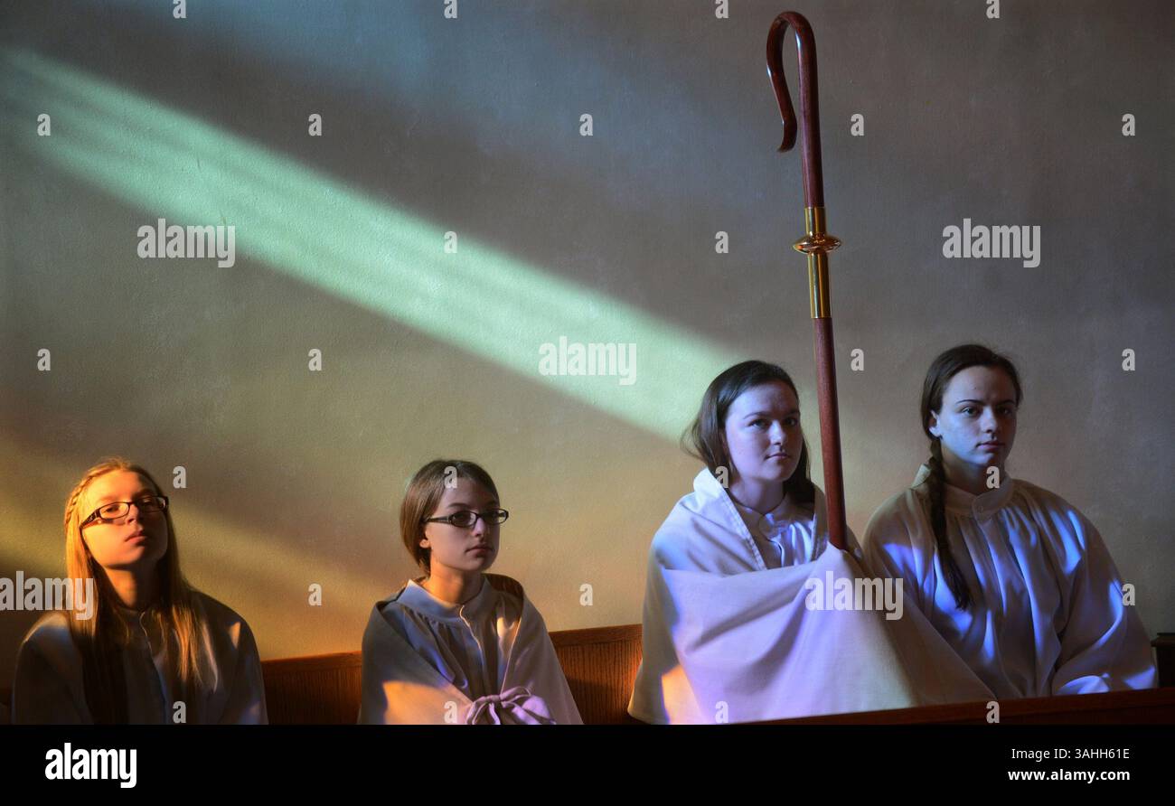 May 31, 2015 - Gipsonia, PA, USA - Altar girls watch as Sheila Ryan of Valenica celebrates the Rite of Consecration of Virgins Living in the World in the Diocese of Pittsburgh on May 31, 2015 in Gipsonia, Pa. (Credit Image: © Nate Guidry/TNS/ZUMA Wire) Stock Photo