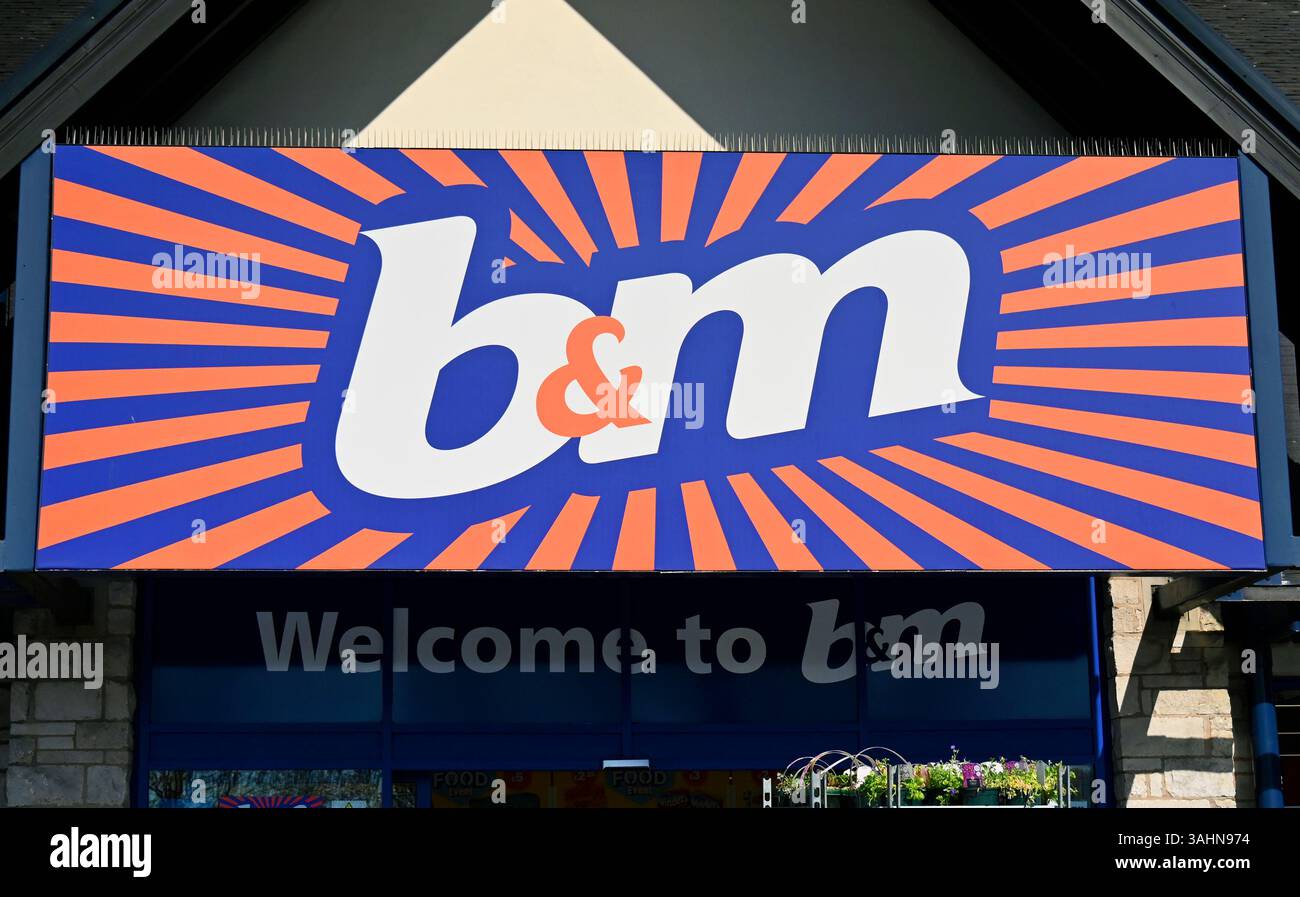 B & M Store logo. The Old Showground, Kendal, Cumbria, England, United Kingdom, Europe. Stock Photo