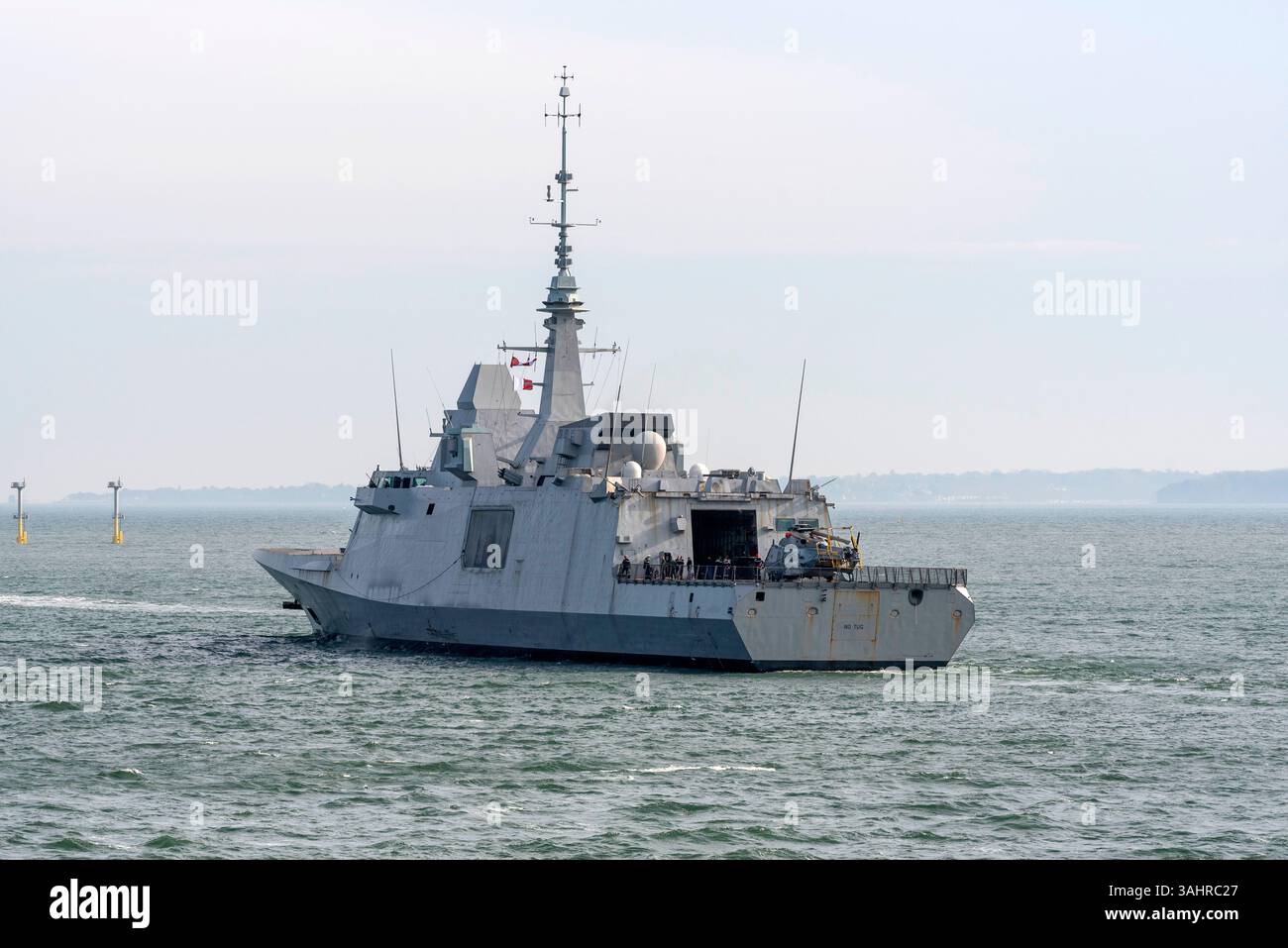 The Solent Portsmouth England UK. 03.04.2025.  French warship Aquitaine on The Solent outbound from Portsmouth  Royal Navy dockyard visit, Stock Photo