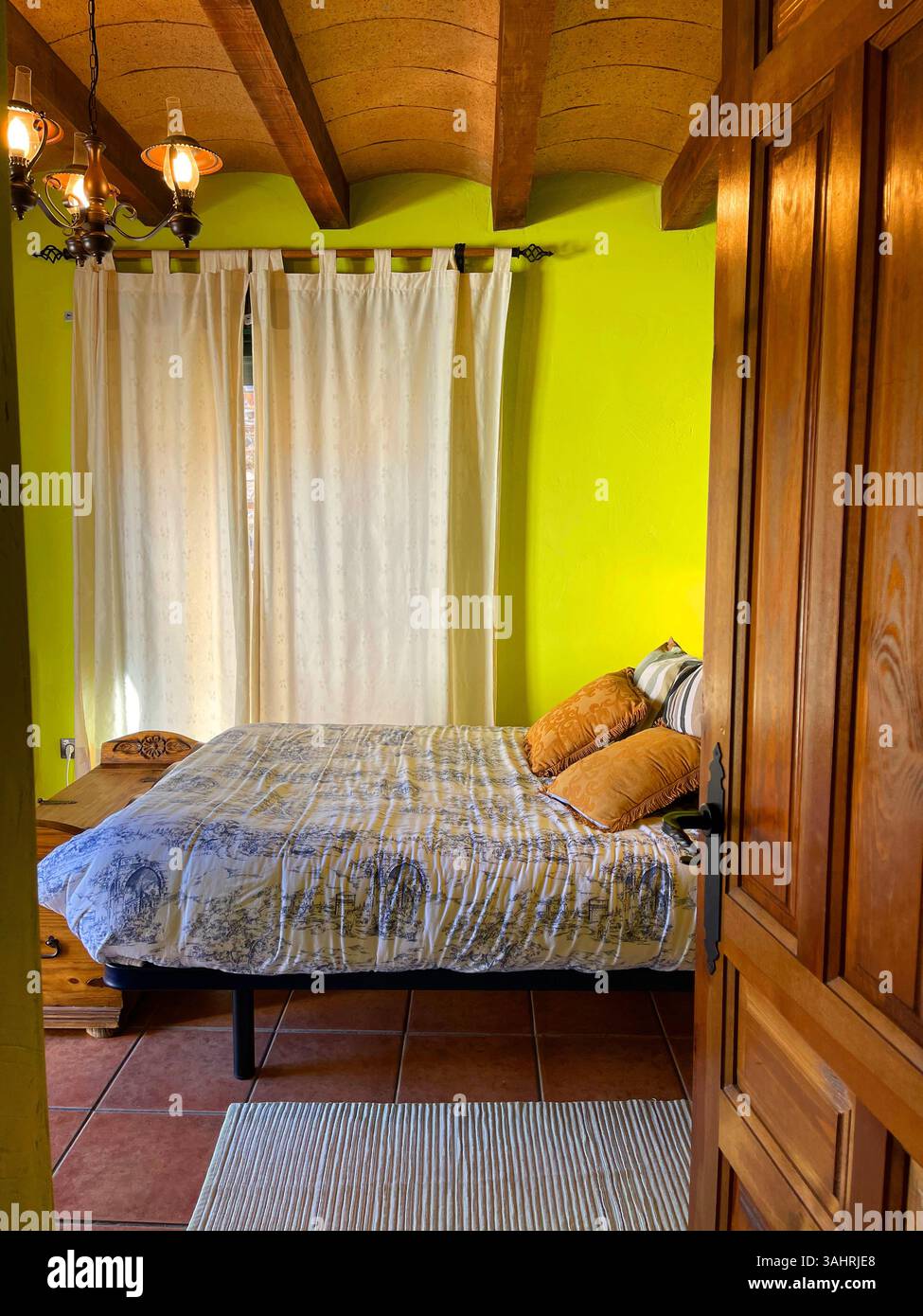 Bedroom in rural house. Braojos de la Sierra, Madrid province, Spain. - Smartphone Captured Stock Image