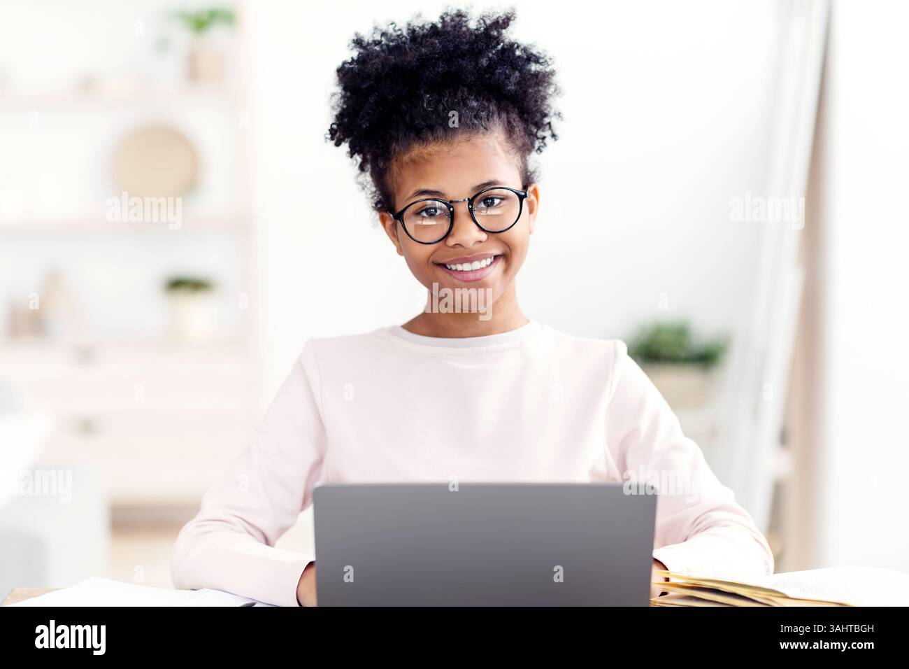 African American Girl Posing At Laptop Sitting At Desk Indoor Stock ...