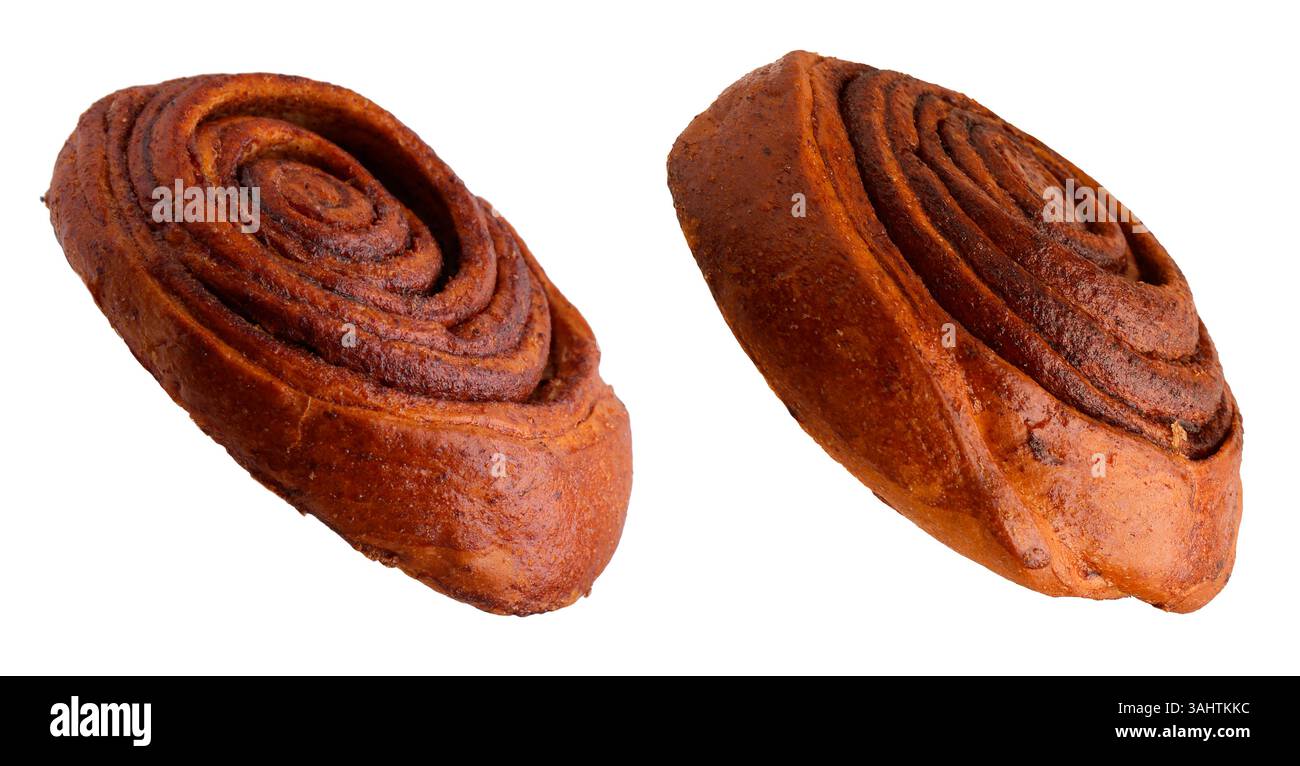Tasty cinnamon rolls in air on white background Stock Photo