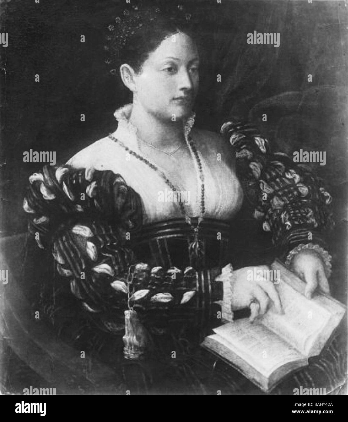 This 16th-century oil painting, attributed to an anonymous Venetian artist, depicts Eleonora d'Este, showcasing Renaissance portraiture with attention to detail in her attire and facial features. Stock Photo