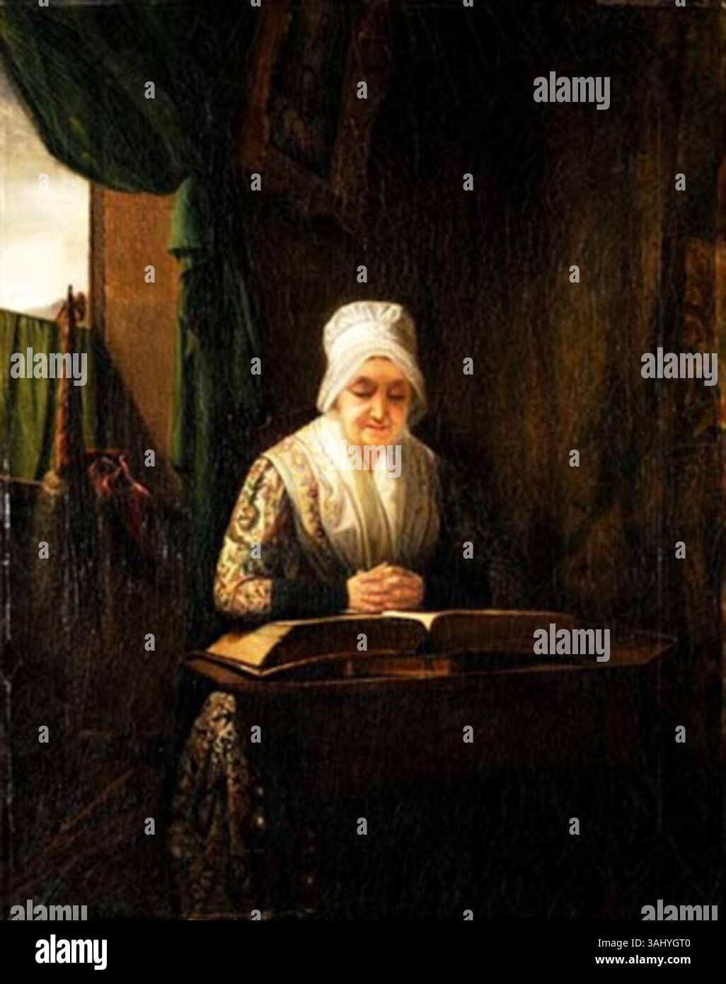 Amile-Ursule Guillebaud's 19th-century genre painting depicts an elderly woman reading the Bible in an indoor setting. The oil on canvas work reflects the artist's focus on intimate, everyday scenes. Stock Photo