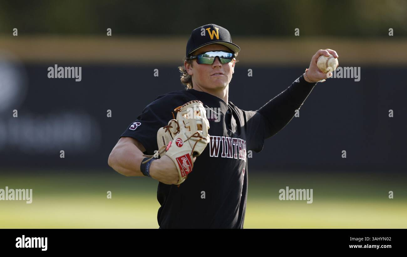 Winthrop outfielder Jaxson Croom throws before an NCAA baseball game ...