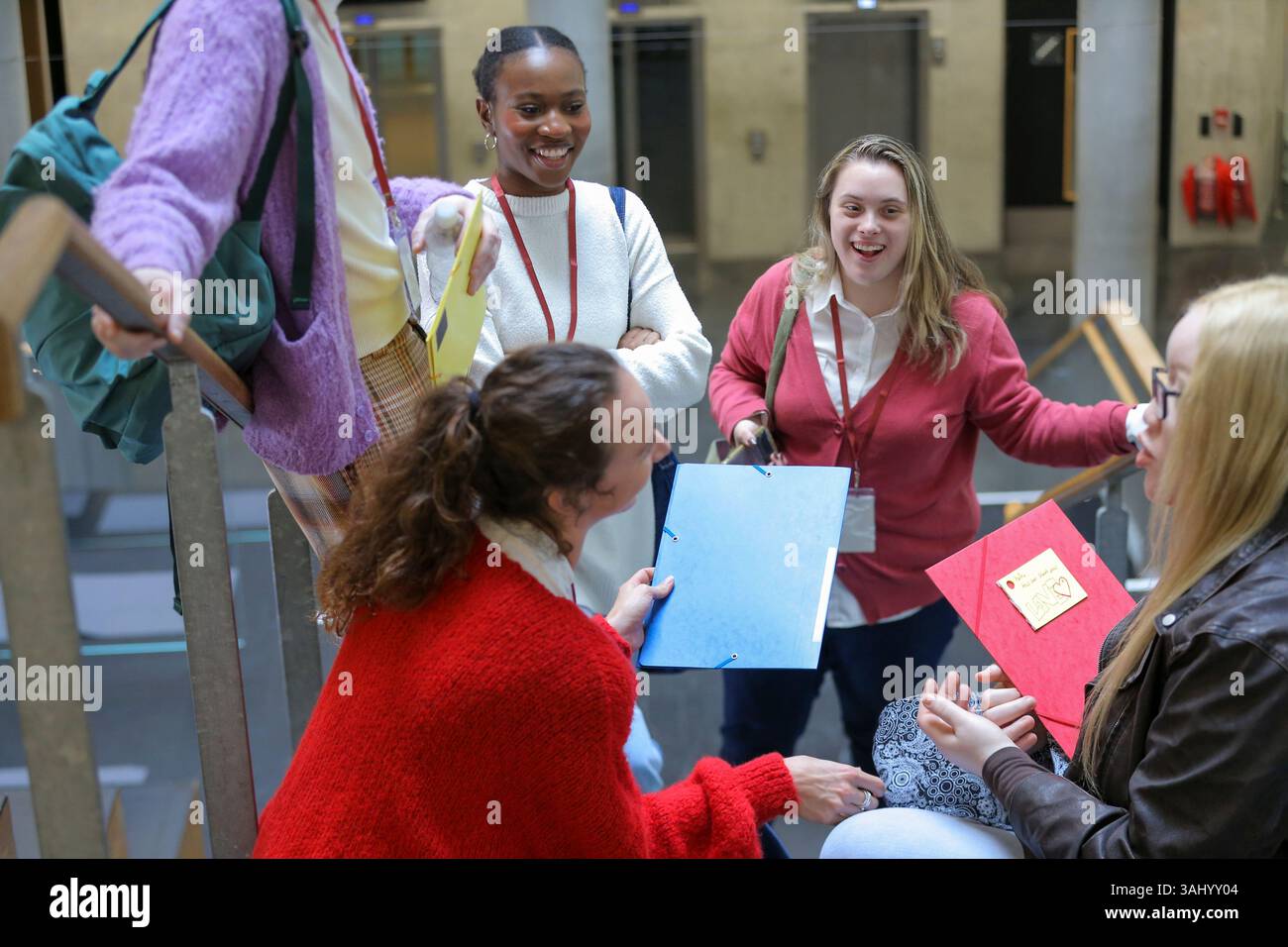 Disabled students talking at university Stock Photo