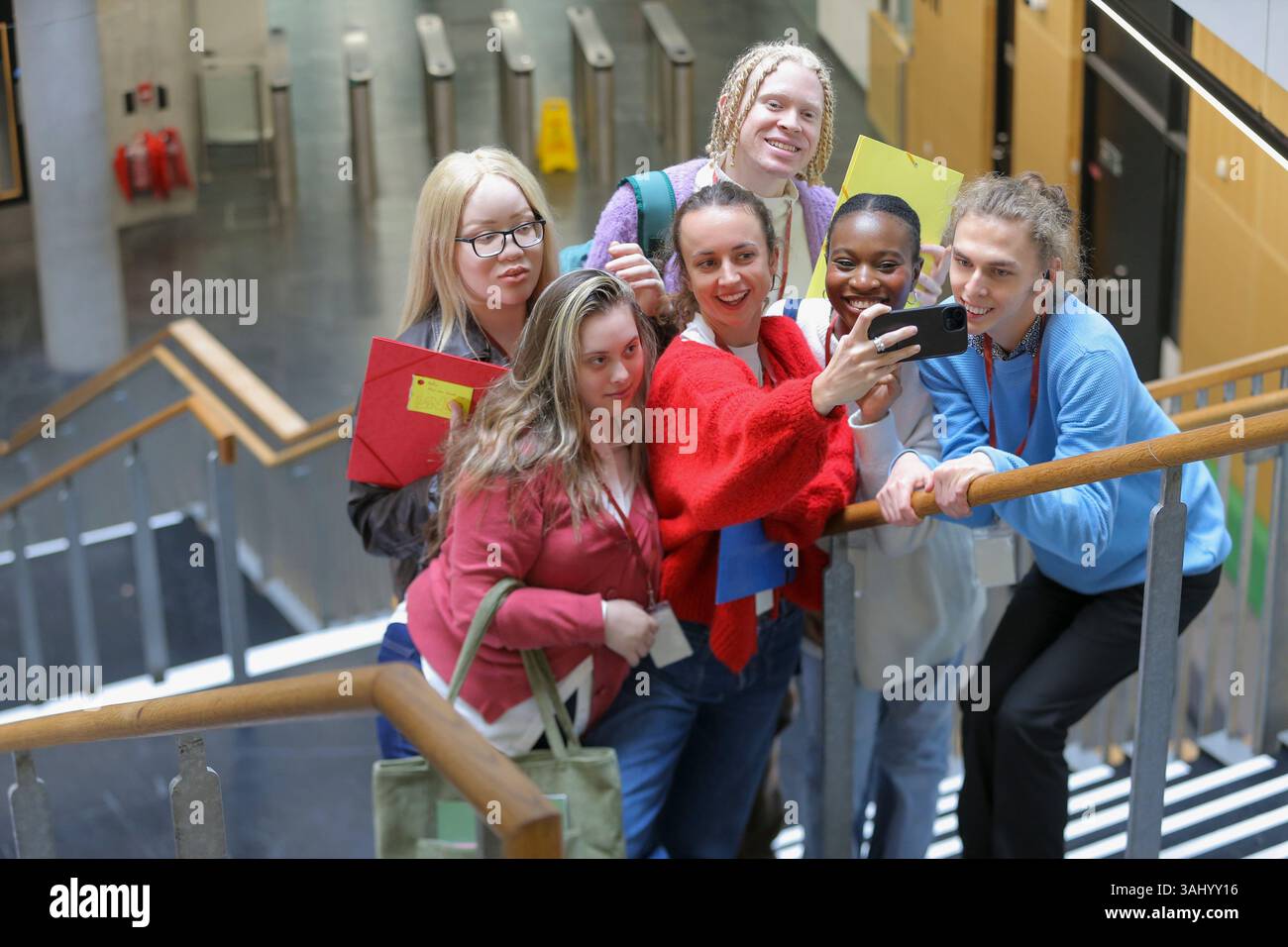 Disabled students taking selfie at university Stock Photo