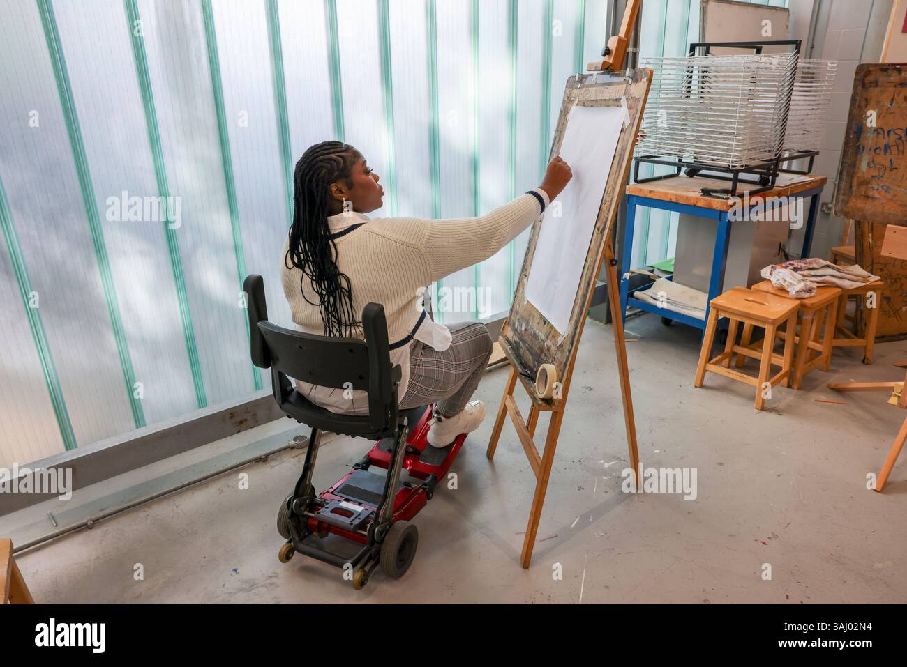 Disabled woman drawing at art classes Stock Photo