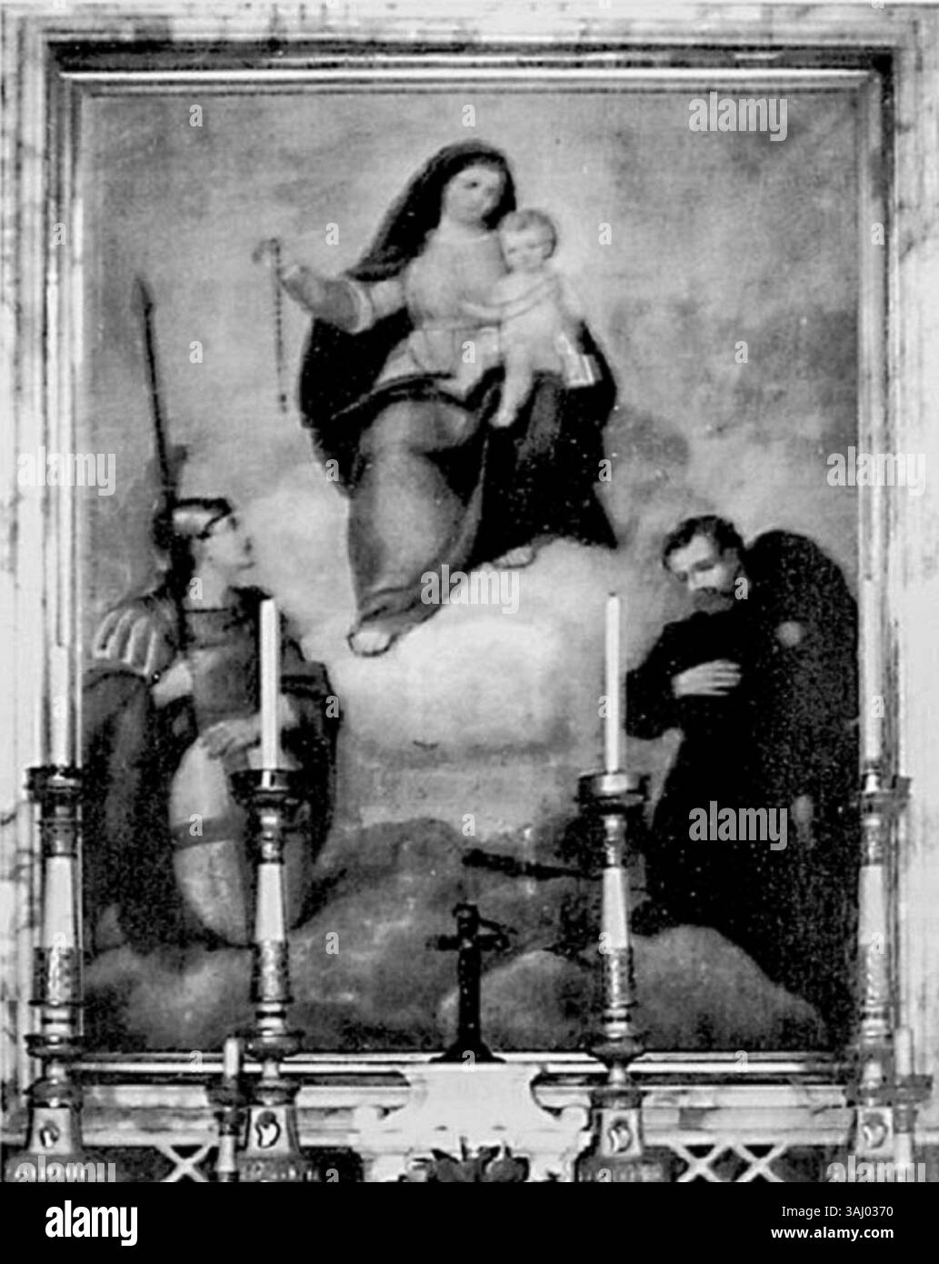 Marcello Baschenis’ 1876 altarpiece, 'Saint George and Saint Contardo d'Este in Adoration of the Madonna of the Rosary,' is housed in the Church of Sant'Andrea in Foggia, Italy. Stock Photo