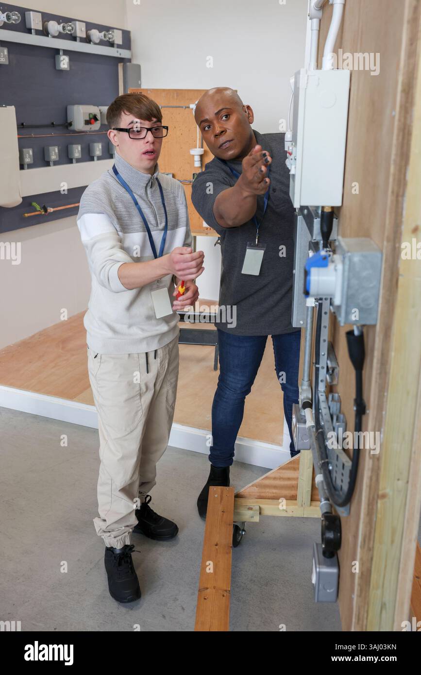 Disabled men working in workshop Stock Photo