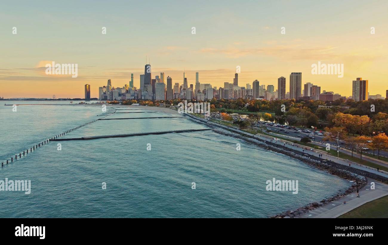 Chicago Skyline at Sunset by Lake Michigan. Scenic view of the Chicago ...