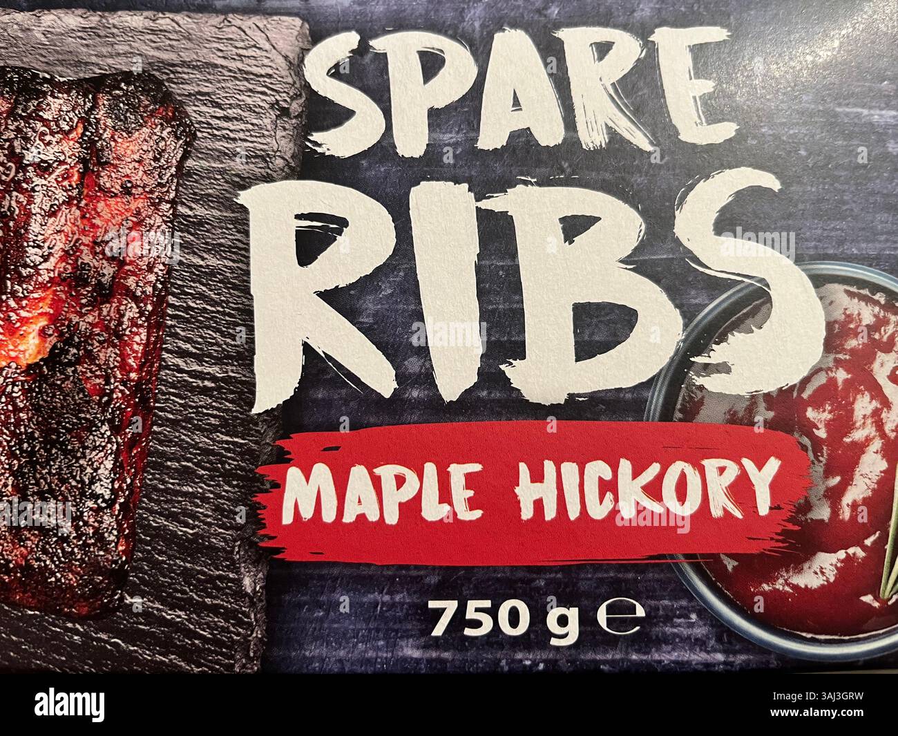 Spare ribs with maple hickory packaging, product of Germany, Grill ready, BBQ ready, ready to cook, Ready-to-grill BBQ ribs with maple glaze - Smartphone Captured Stock Image