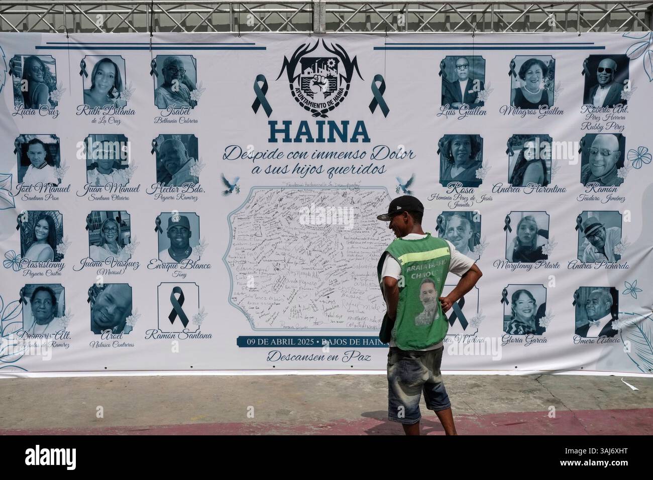 A banner features some of the victims of the Jet Set nightclub roof ...