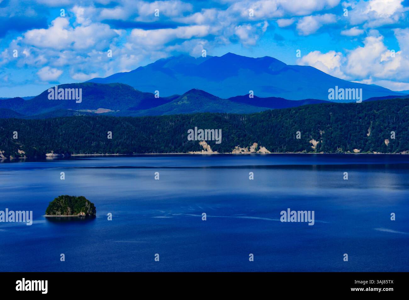 Mt.Shari seen over Kamuishu Island from Lake Mashu, Hokkaido Stock Photo