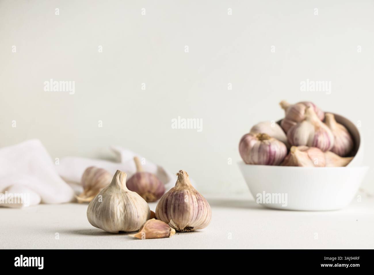 Fresh garlic and clove on white background Stock Photo - Alamy