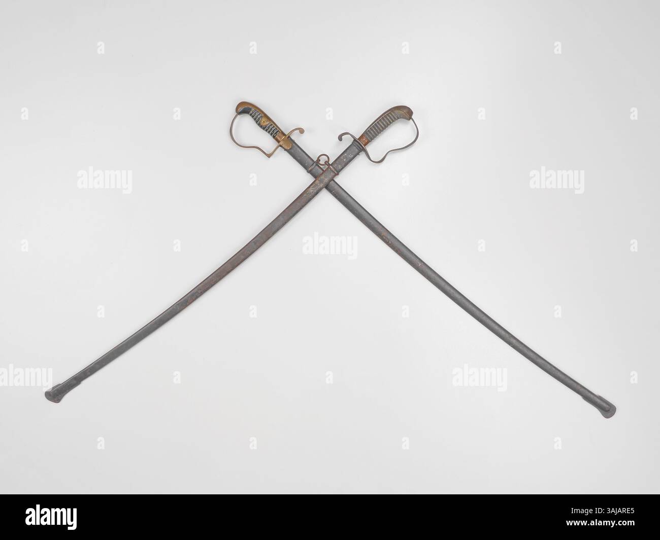 Two swords are displayed in a white background Stock Photo - Alamy