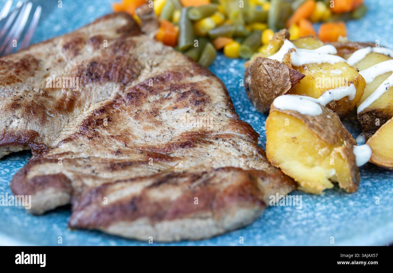 Grilled steak with potatoes and mixed vegetables Stock Photo - Alamy