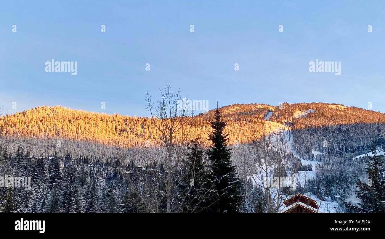Sunrise Light on Snowy Mountain Ski Slopes - Smartphone Captured Stock Image